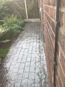 A pattern imprinted concrete patio and paths in the Burnage area of Manchester