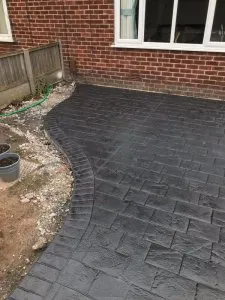 New pattern imprinted concrete driveway