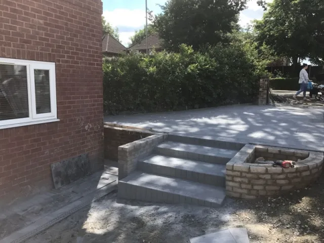 New Driveway and wall in progress New Driveway and wall in progress