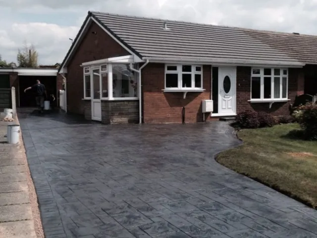 Ash grey with charcoal release colour driveway Ash grey with charcoal release colour driveway
